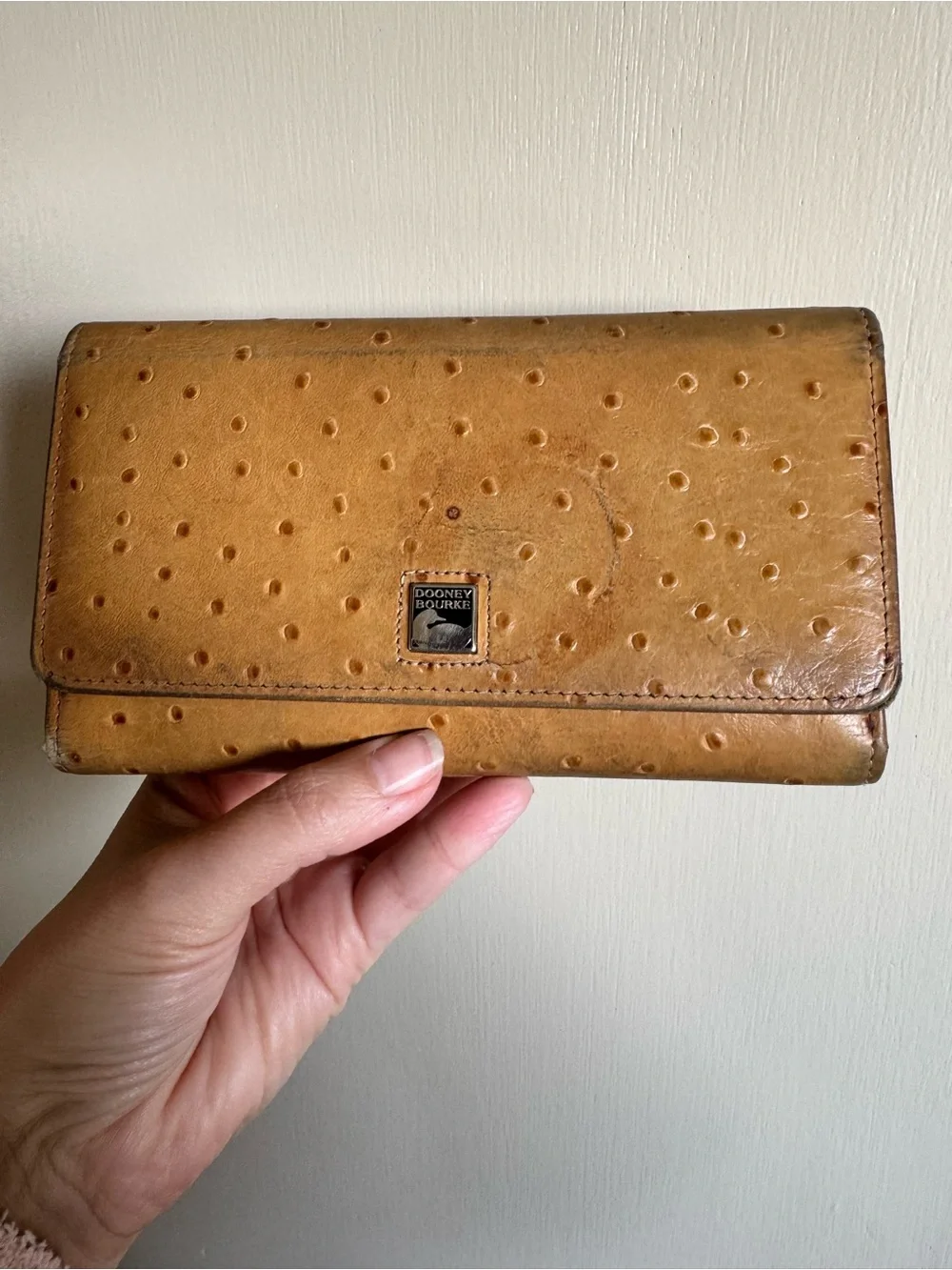 Dooney & Bourke Mustard Ostrich-Embossed Flap Wallet